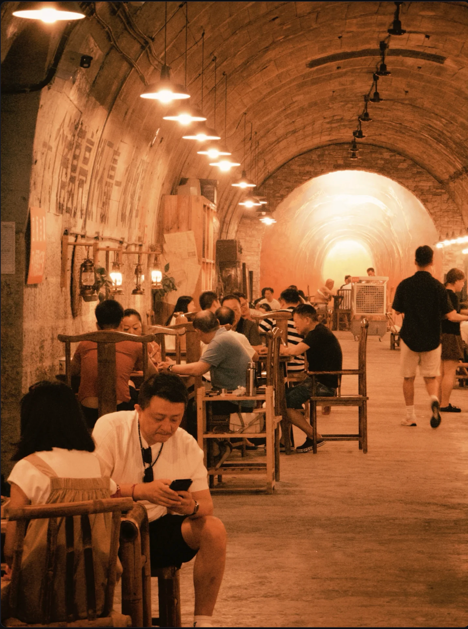 A Chongqing dining space adapted inside a historic tunnel
