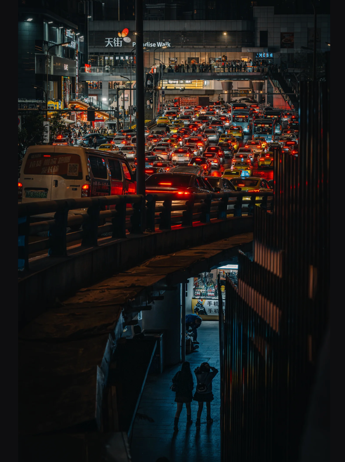 Chongqing traffic, street life and layered public space after dark