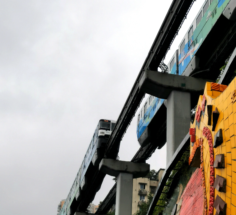 Homes, stairways and streets stacked through a Chongqing hillside